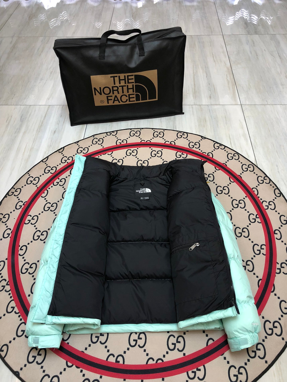 The North Face Mint Green and Black Colorblock Puffer Jacket