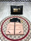 The North Face Blush Pink and Black Colorblock Puffer Vest